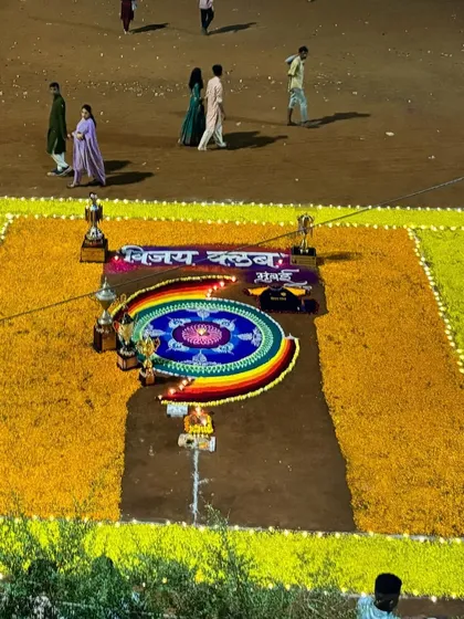 A close-up of the intricate flower rangoli created by our members for the celebration.