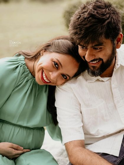 A beautiful close up showing her radiant smile as she leans on her partner. These are the happy, relaxed moments that make the best memories.
