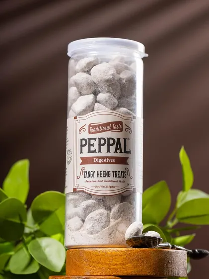 A close-up shot of Peppal's Tangy Heeng Treats, focusing on the product's texture. The simple, clean setup is effective for e-commerce and catalog use.