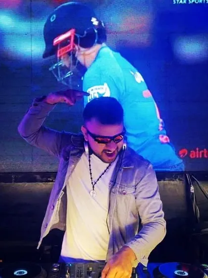In the zone, mixing tracks with a live cricket match on the screen behind me. I can create a vibe for any type of event.