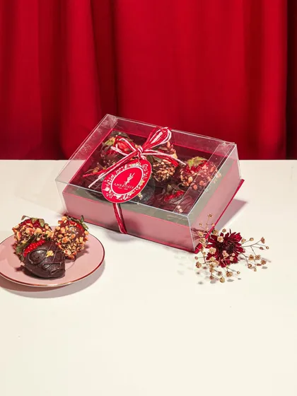 A box of our chocolate-dipped strawberries, a classic romantic treat, perfect for Valentine's Day gifting.
