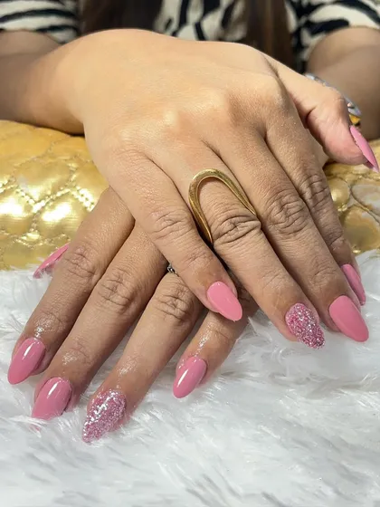 A lovely shot of the finished pink and glitter set. These temporary extensions are perfect for adding length and style for a special event or just for fun.