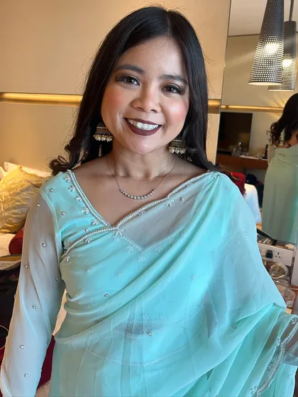 A full portrait of my client. I also assisted with her saree draping to ensure she felt confident in the traditional attire.