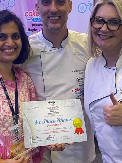 Posing with the judges and my first-place winner certificate. Their thumbs-up says it all!