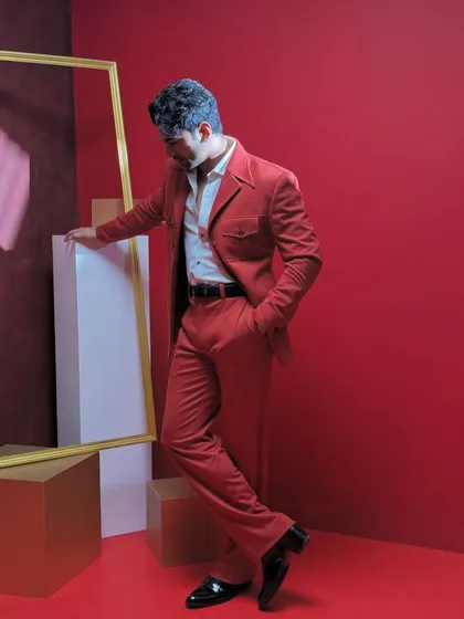 Style isn't just for traditional events. This bold, custom-tailored red suit, seen here on actor Taaha Shah, showcases our expertise in creating sharp, contemporary Western wear for any high-profile occasion.