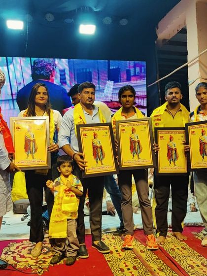 Honoring our champion athletes at the Dronacharya Mela in Dankaur. Our academy and its winners are recognized by the community for their achievements.