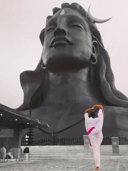 Practicing in front of the Adiyogi statue is a powerful experience that connects us to the very source of yoga. This pose is an offering and a reminder that yoga is a union, a way to breach our physical boundaries and experience a deeper connection with life itself.