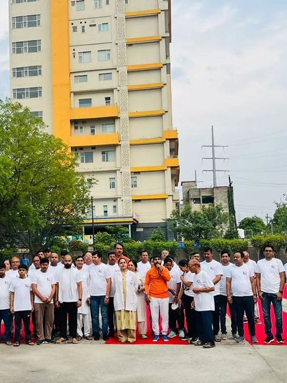 A large group gathering for a yoga event at Kailash Hospital in Sector 71. It was wonderful to guide the hospital staff and community.