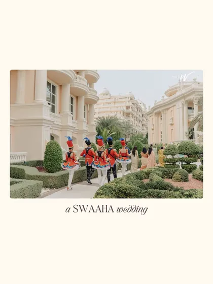 The marching band in formation, creating a grand and organized spectacle for the groom's entrance.