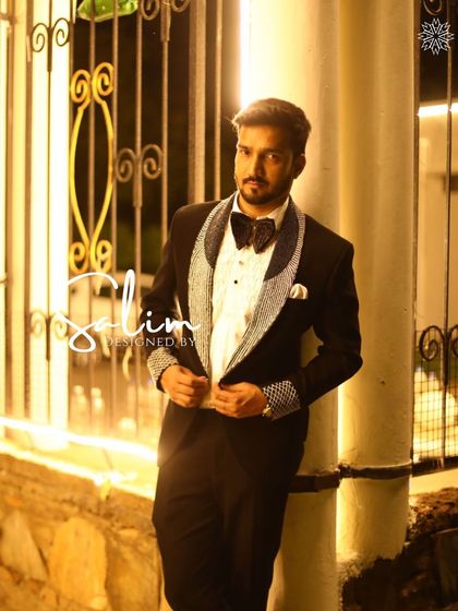 Another shot of the model in the black tuxedo with crystal-studded lapels. This is a timeless look that I can customize to your specific measurements.