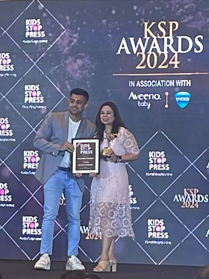 On stage receiving the award for Best Family Photographer. A huge thank you to everyone who voted and has supported my photography journey.