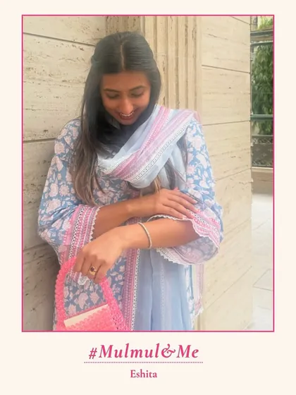 Eshita looking cute and chic in one of my printed kurta sets, paired perfectly with a pink bag. I love seeing your unique styling. #MulmulAndMe.