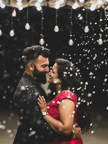 A magical pre-wedding portrait with a creative snow effect, creating a dreamy, fairytale-like atmosphere. We love experimenting with different themes to make your couple photoshoot truly unique and memorable.