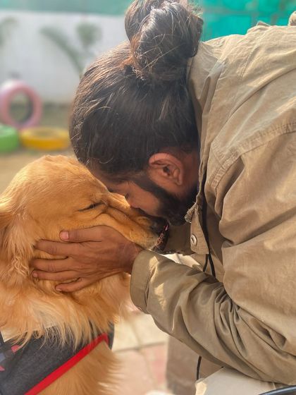 Fur-ever love. A quiet moment of affection with a beautiful Golden Retriever after a long day of play.