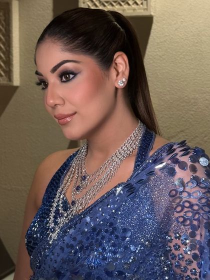 A side profile of the sleek high ponytail, showing its clean lines and length.