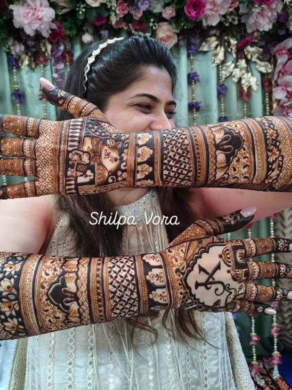 A side view of the full bridal design, demonstrating how the patterns wrap around the arm for a complete, 360-degree look.