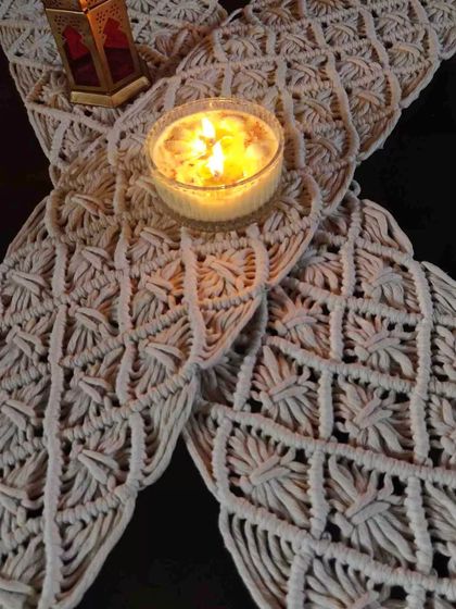 Add a bohemian flair to your dining table with our macrame table mat. The intricate pattern creates a beautiful texture, perfect for special occasions or everyday elegance.