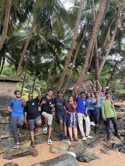 Relaxing under the coconut trees, a typical scene from our chilled-out Gokarna trips.