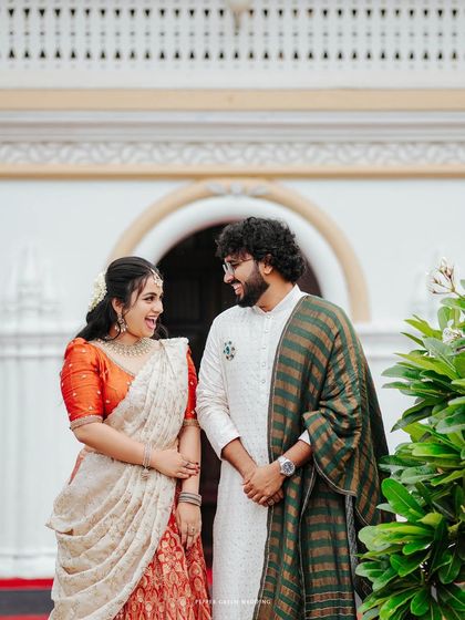 A sweet portrait of the engaged couple, their traditional attire and happy expressions perfectly captured.