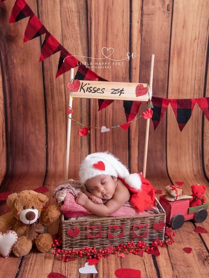 Kisses for 25 cents! This Valentine's Day kissing booth is one of my most popular and adorable themes for capturing a bit of holiday love.