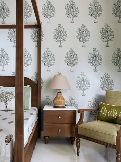 A subtle and elegant tree-motif wallpaper designed for a master bedroom. The repeating pattern adds a sense of calm and sophistication, blending seamlessly with the room's aesthetics.