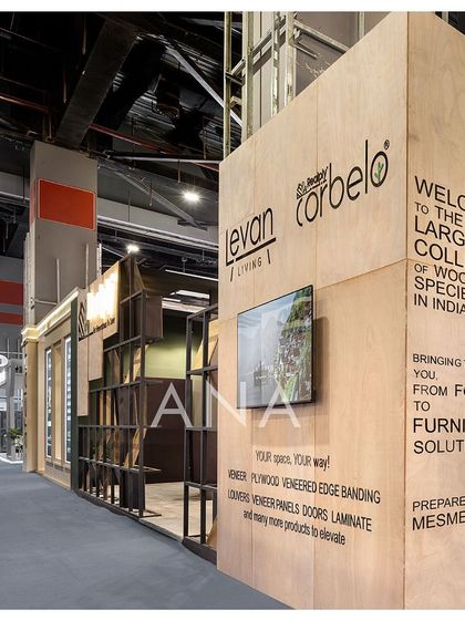 The exterior of the Realply stall at Matecia '23 features a massive plywood-clad volume with bold typography. This design element serves as a powerful billboard, welcoming visitors to explore the brand's collection.