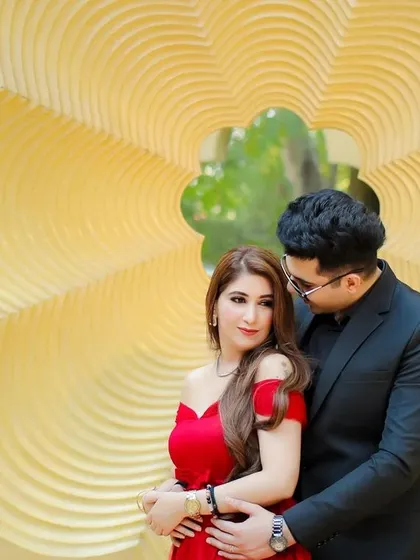A close-up, romantic embrace during a pre-wedding shoot. We guide our couples to interact naturally, allowing us to capture genuine expressions of affection that make for beautiful, heartfelt images.