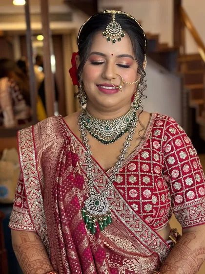 The complete look, showcasing the harmony between the makeup, jewelry, and the traditional attire.
