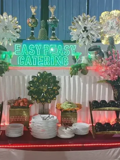 Our dessert counter is ready for a celebration, featuring a variety of sweets and our branded light-up sign. We pay attention to presentation to make every station a visual treat.