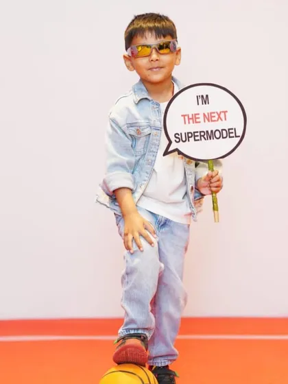 We love the confidence. This young man is ready to take on the fashion world.