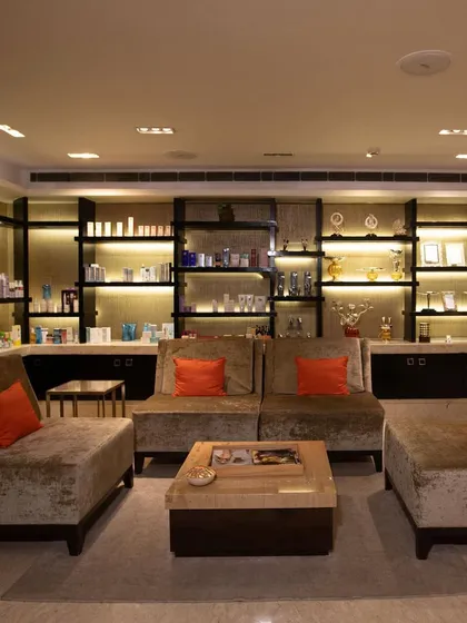 Another view of our plush and inviting lounge area, where clients can unwind in a sophisticated and tranquil environment.