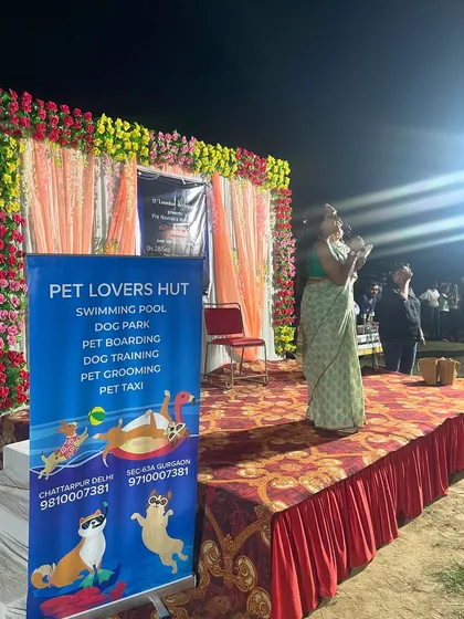 Our banner lists the key services we offer, from our swimming pool and dog park to boarding, training, and even a pet taxi. This was taken at a community event where I was invited to share my expertise.