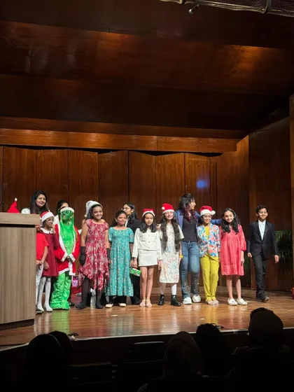 The full cast of our Christmas play takes a bow, a beautiful moment of teamwork and shared success.