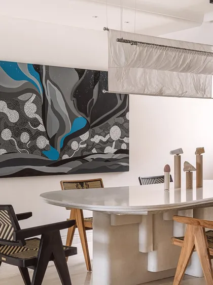 Another view of the dining room, highlighting the stunning 'Starry Nights' inspired artwork by House of Berserk. The art adds a dynamic and emotional layer to the otherwise serene space.