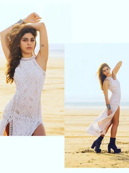 For a completely different vibe, I styled Alaya F in this boho-chic white crochet dress and chunky black boots. It's a perfect look for a beach festival or a relaxed, free-spirited photoshoot.