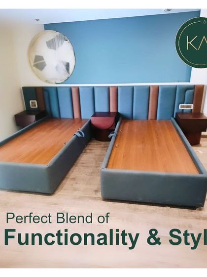 We designed these twin beds with a shared, continuous headboard featuring two-tone vertical upholstery. This is a perfect solution for a shared bedroom, offering a cohesive design that is both functional and stylish.