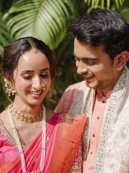 The groom looks at his bride with pure adoration. This sweet, candid moment captures the love and friendship that form the foundation of their relationship.
