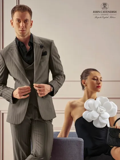 A final look from the menswear campaign, showcasing a classic, elegant pairing. My work ensures that both models look their best, creating an aspirational image for the brand.