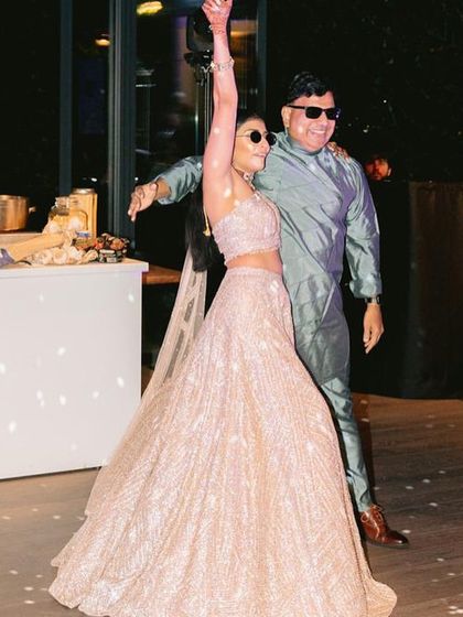 The bride and her father at her wedding in Italy. We provided virtual tutorials for the entire family to learn their dances.