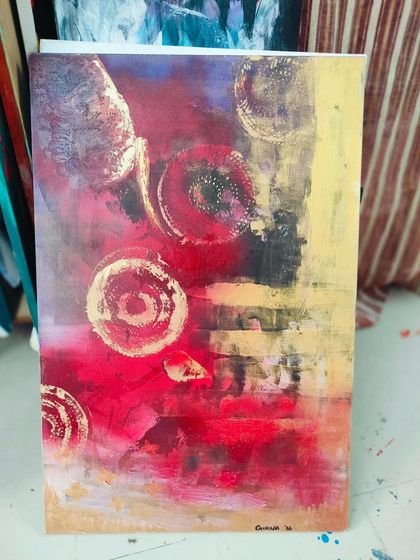 An abstract piece in red and gold with circular motifs. This older acrylic painting is available for purchase.