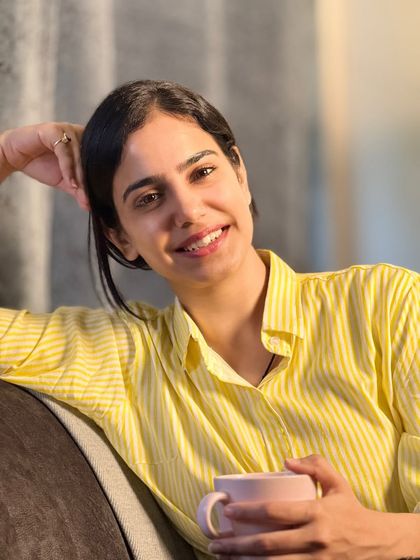 A candid, happy moment at home. This close-up shot is perfect for brands looking for a friendly and approachable face for their digital or print campaigns.