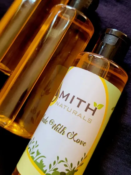 My homemade Carrot Oil, which is wonderful for both hair and skin. For hair, it restores moisture, tames frizz, and helps it grow faster and thicker. It's also gentle enough for babies' skin.