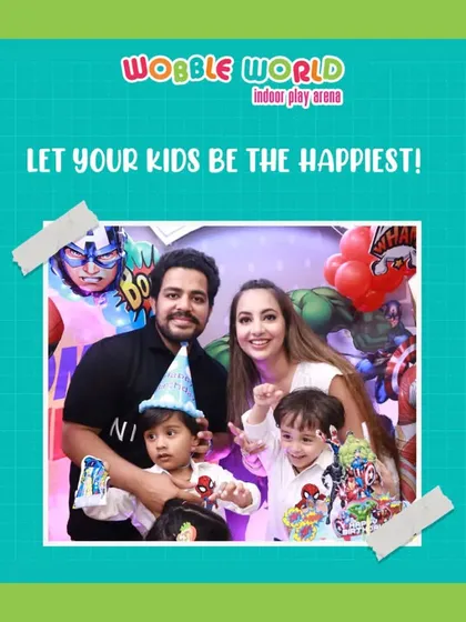 A happy family of four enjoying a superhero-themed party. We make sure everyone, from the youngest to the oldest, has a fantastic time.