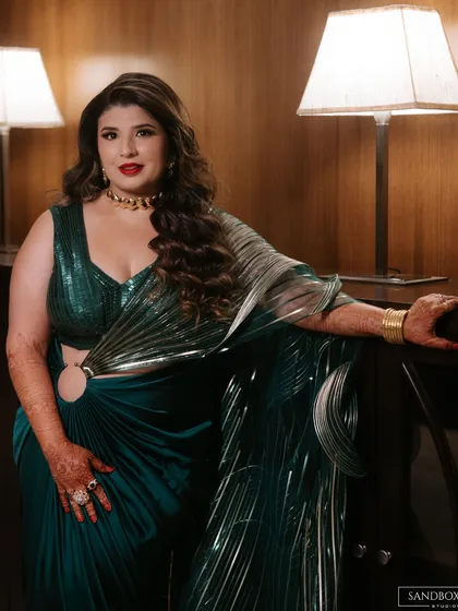 A series of portraits showcasing the bride's elegant and modern reception look, highlighting the details of her designer saree.
