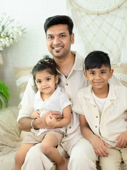 A proud father with his two wonderful children. I aim to capture the unique bond each parent shares with their kids.
