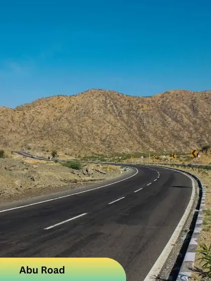 The winding Abu Road cutting through the dry, hilly landscape of Rajasthan is a joy to travel on in our comfortable caravan.