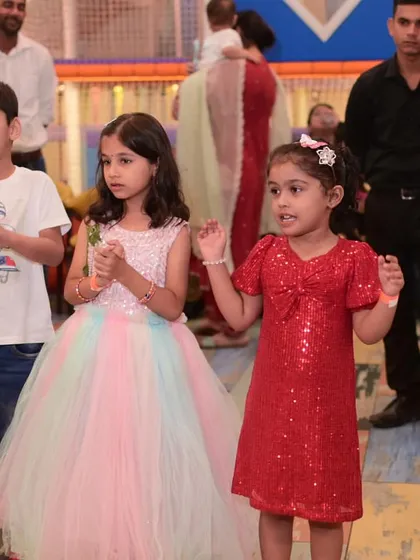 A group of children completely engaged in the party activities. I plan the event flow to keep the energy high and the fun going.