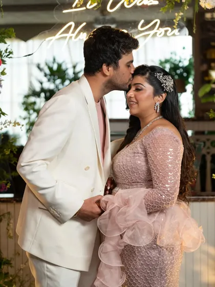 A tender moment during a stylish pre-wedding cocktail party. We capture the chic atmosphere and romantic mood of all your wedding events, not just the main ceremony.