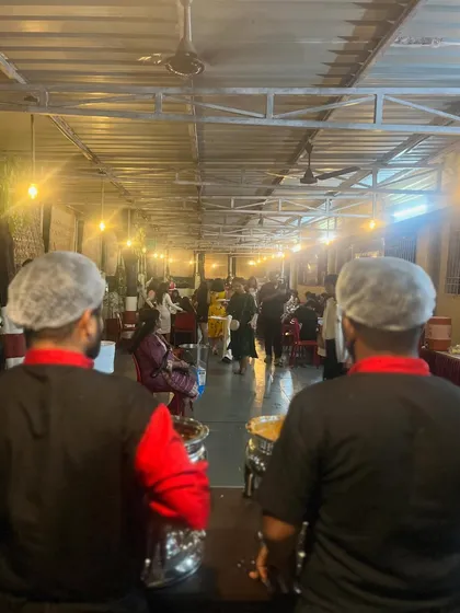 This image shows my catering staff behind the scenes, working to ensure the buffet is always ready and the service runs efficiently.