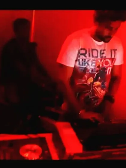 An early gig, bathed in red light. I've played in all kinds of venues, and each one has taught me something new about being a DJ.